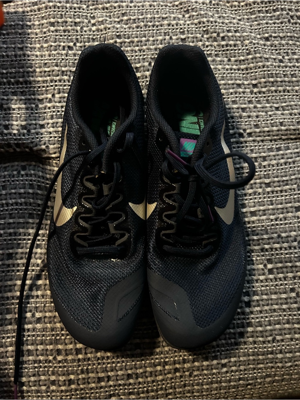 Nike Black Athletic Sneakers with Cream Swoosh - long distance track spikes